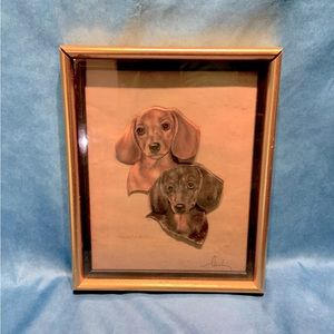 Signed, framed artwork of smooth-hair Dachshund puppies